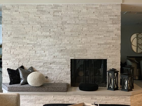 fireplace refaced with white birch ledger stone