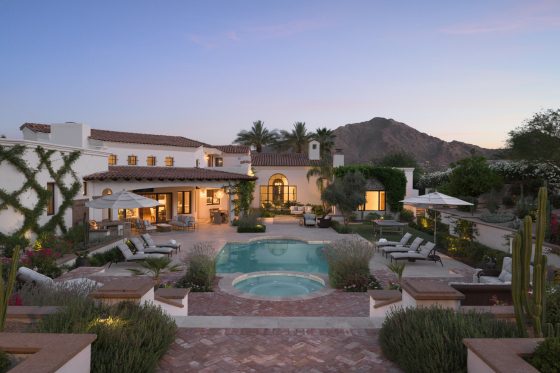 outdoor pool, second home, Arizona, in-ground pool, brick pool deck, chaise lounges, patio umbrellas, mountain view