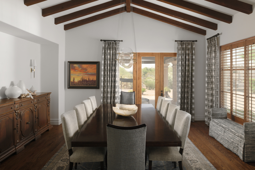 dining room, Arizona, wood-beamed ceiling, white dining chairs, dining table, window treatments, rug, chandelier