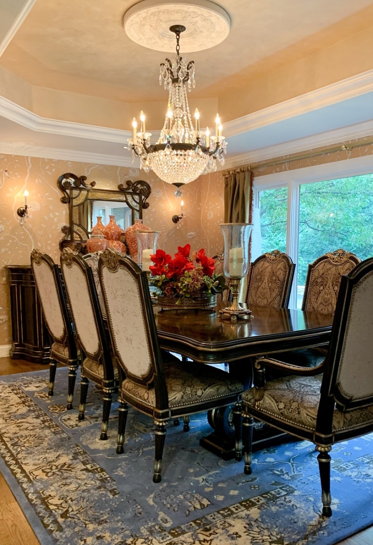 traditional dining room, traditional dining room, dining room chairs, dining table, crystal chandelier, ornate mirror, traditional rug