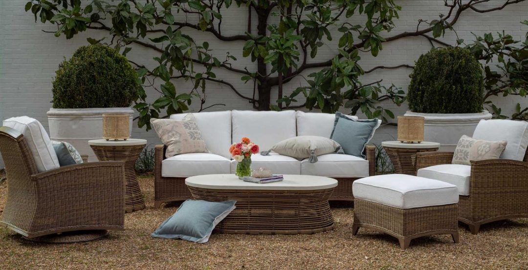 outdoor wicker furniture, outdoor swivel chairs, outdoor sofa, outdoor cocktail table, white cushions, pillows, outdoor side table 