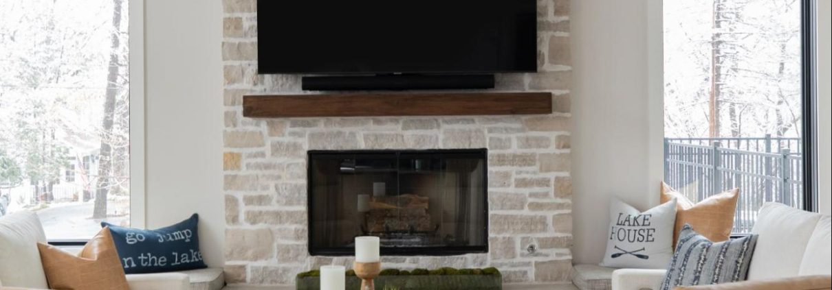 Cozy textures invite hanging out in this great room, whether to binge watch a new series, play board games with the family or curl up with a hot cup of tea and a good book.