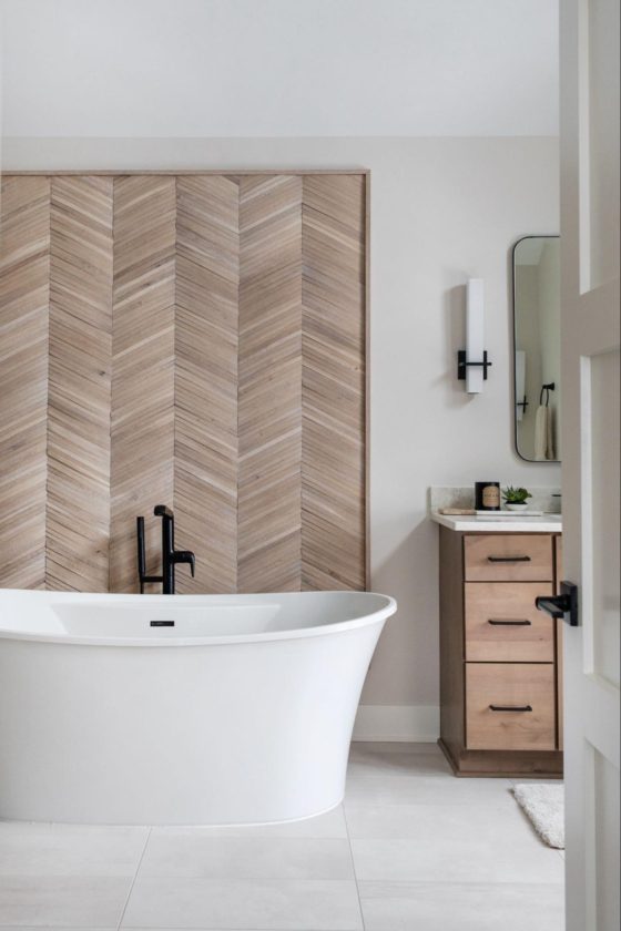 Reclaimed wooden panels in a chevron pattern make for a stunning feature wall.